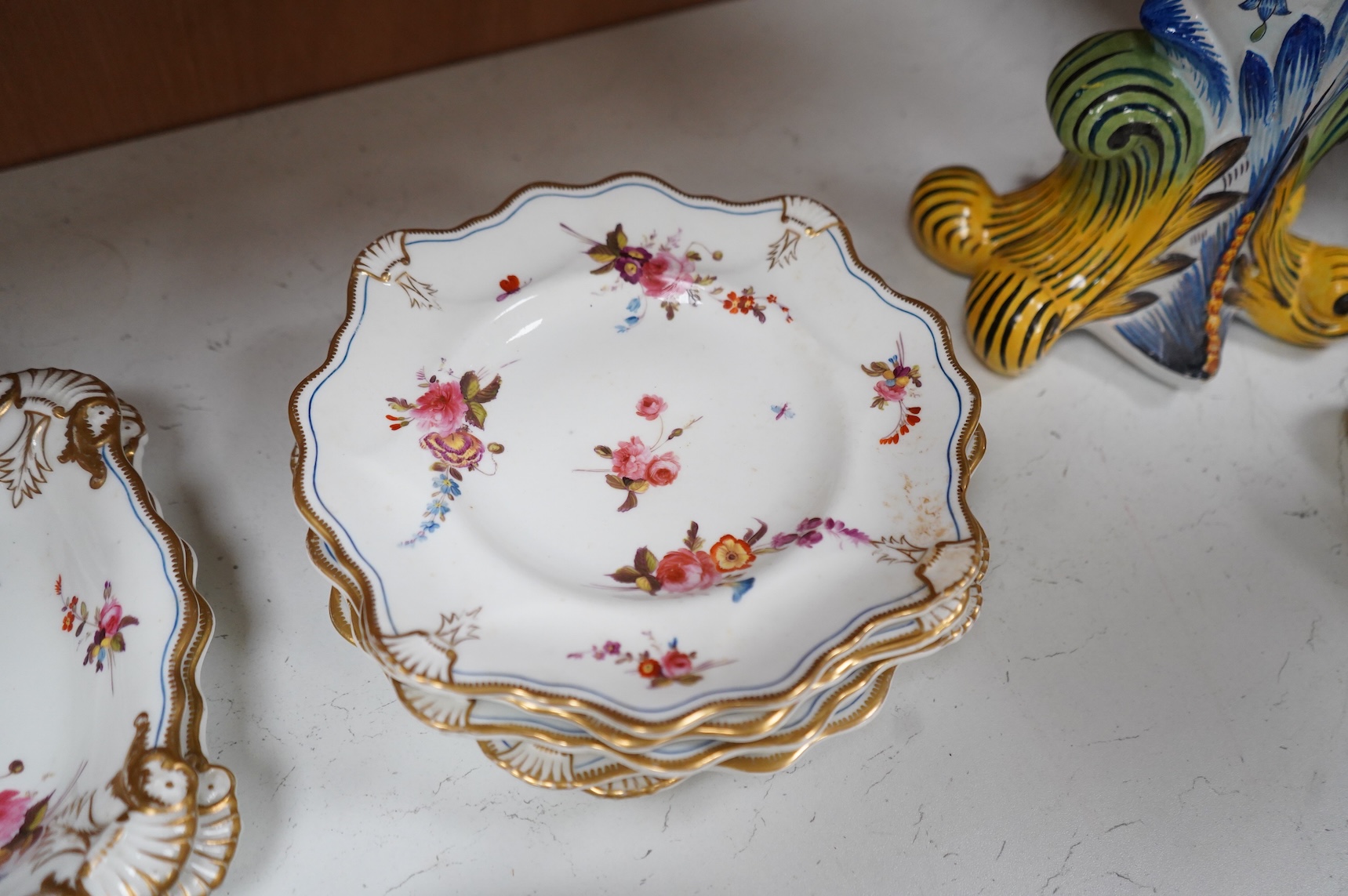 A set of six early 19th century Spode floral dessert plates, and an English porcelain part dessert service, c.1835, largest 22cm in diameter